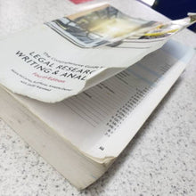 Load image into Gallery viewer, The Comprehensive Guide to Legal Research, Writing &amp; Analysis 4th Edition by Moira McCarney 9781774624944 (USED:ACCEPTABLE; shows heavy wear, rips, highlights, see pic) *141h
